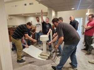 Read more about the article Pop Quiz : ) How many Lutheran Laymen does it take to move a Baptismal Font?